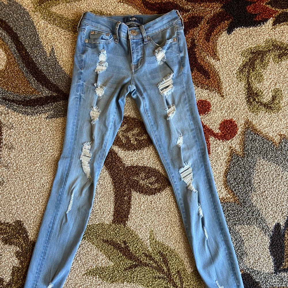 low cut blue ripped jeans